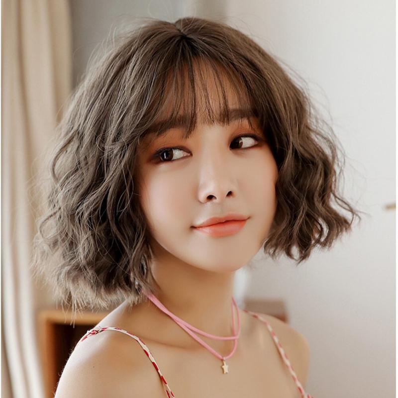 Kiểu tóc ngắn ngang vai xoăn xù